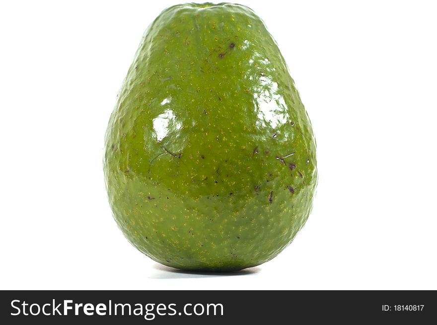 An Avocado isolated on a white background. An Avocado isolated on a white background