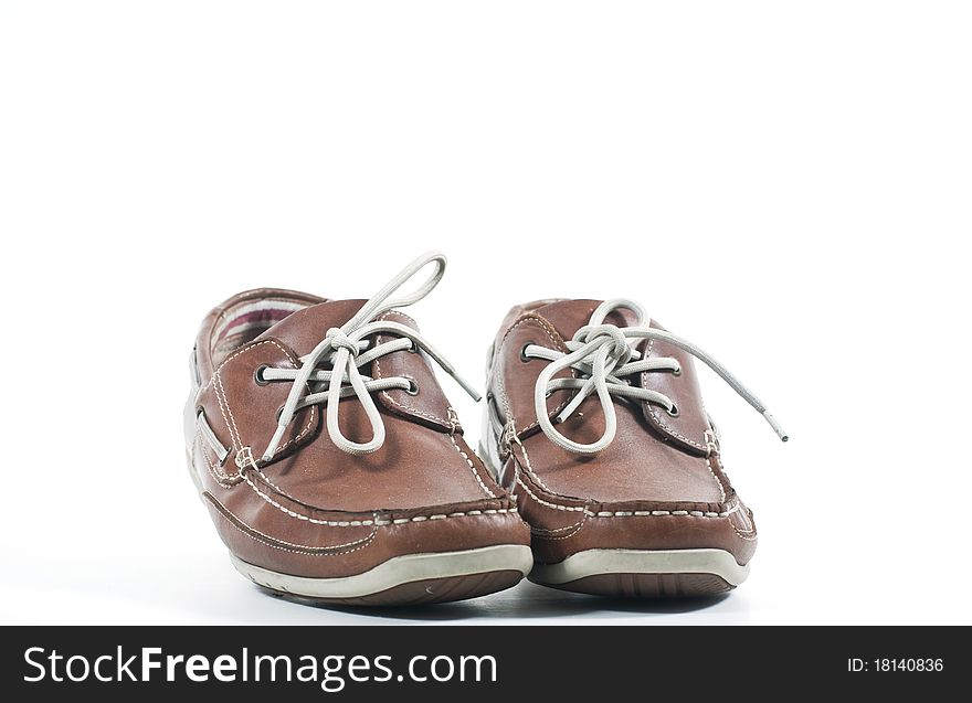 Old Deck Shoes isolated on a white background with copy space