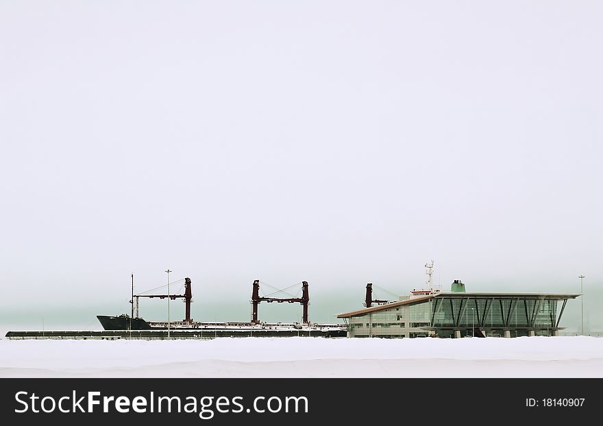 The ship with snow-covered port