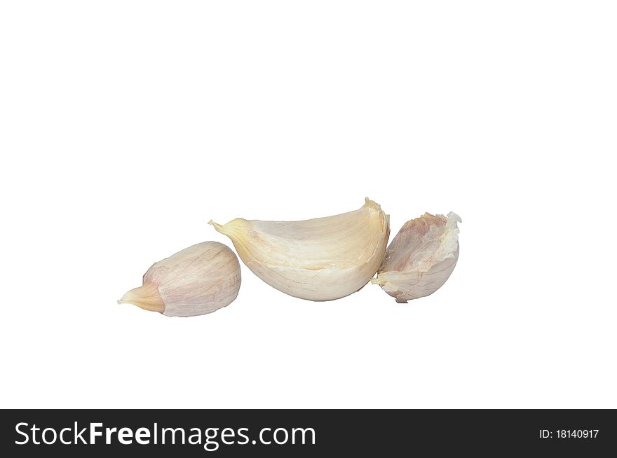 Garlic cloves on the white