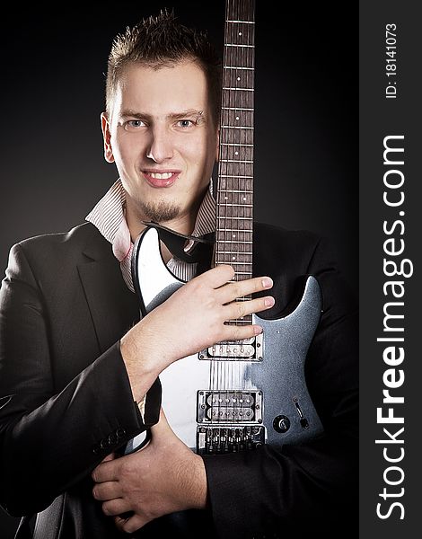 Portrait of young guitarist