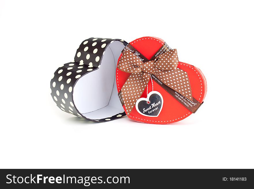 Gift Box Shaped Red Heart on a white background. Gift Box Shaped Red Heart on a white background.