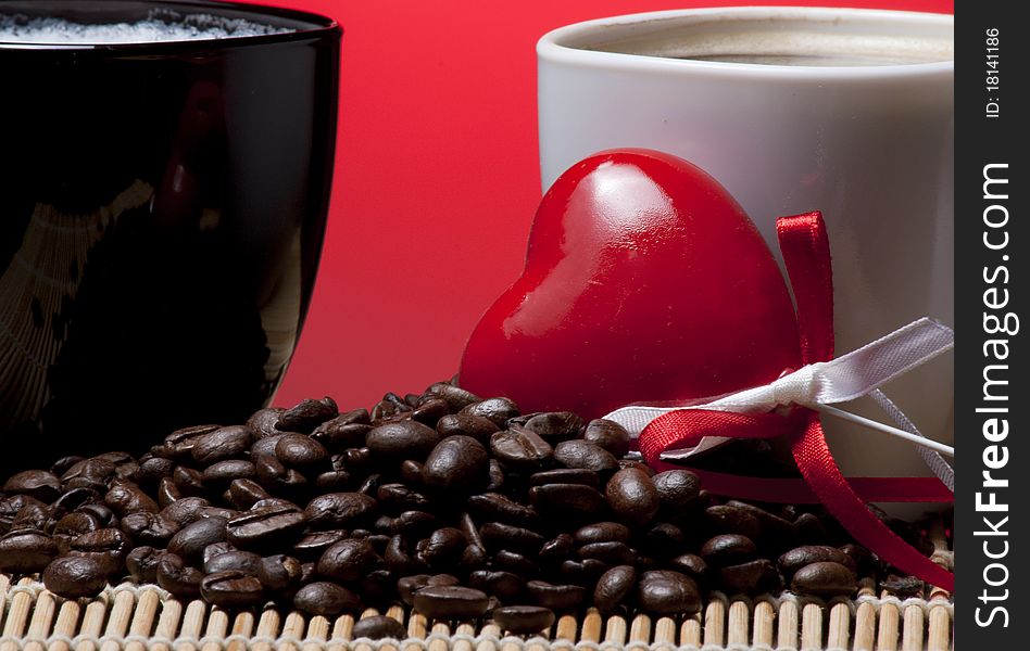 Coffee cups, heart and coffee beans. Coffee cups, heart and coffee beans