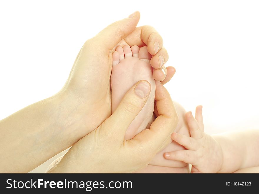 Newborn baby feet isolated on white