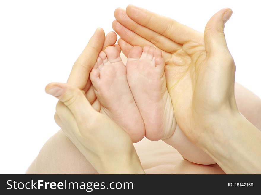 Newborn baby feet isolated on white