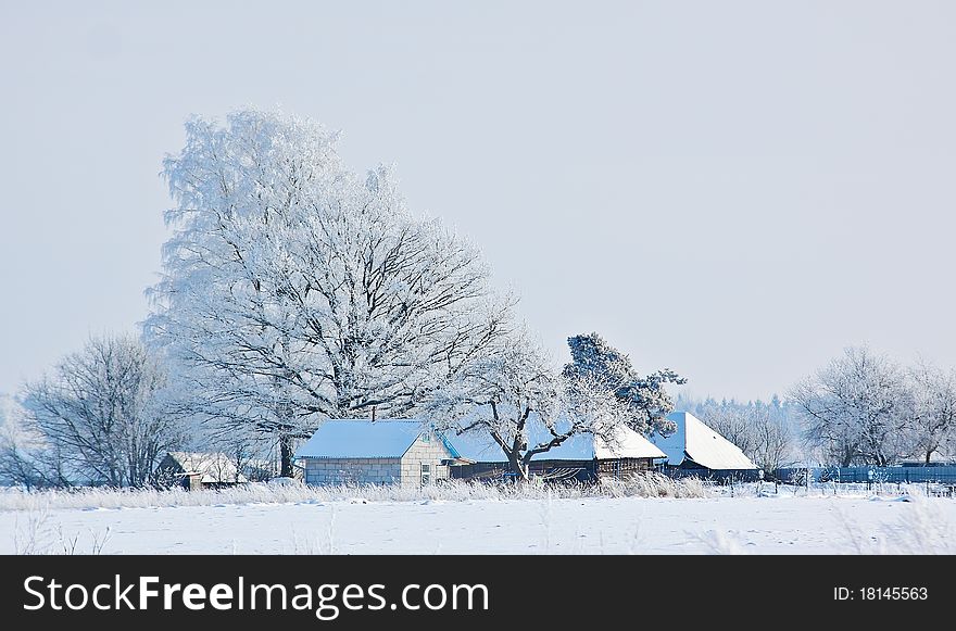 Winter landscape near russian village