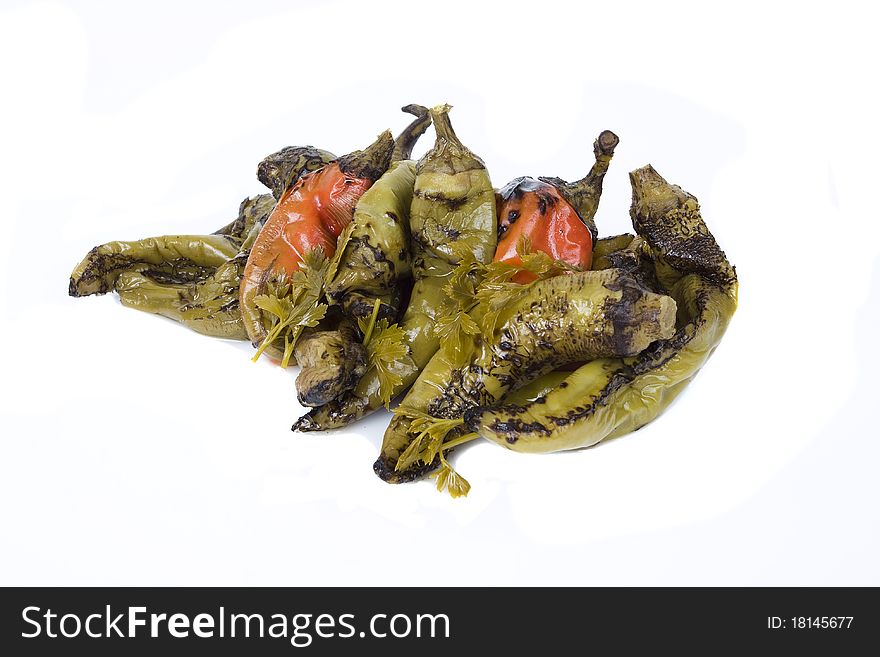 Green hot peppers with other vegetables isolated on white background