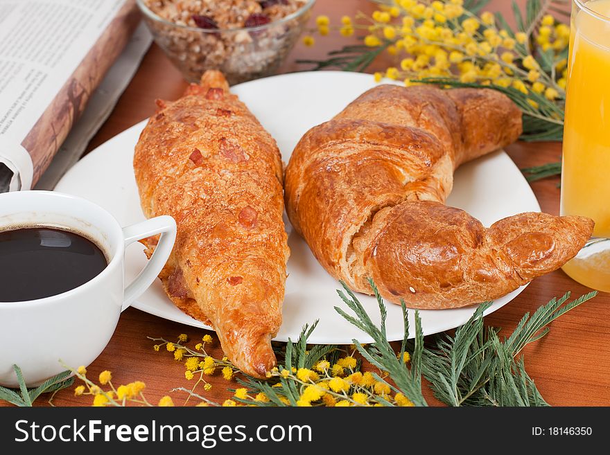 Continental breakfast served with coffee and orange juice.