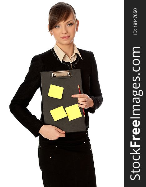 The office worker working in office and holding the document case with stickers in the hands. The office worker working in office and holding the document case with stickers in the hands