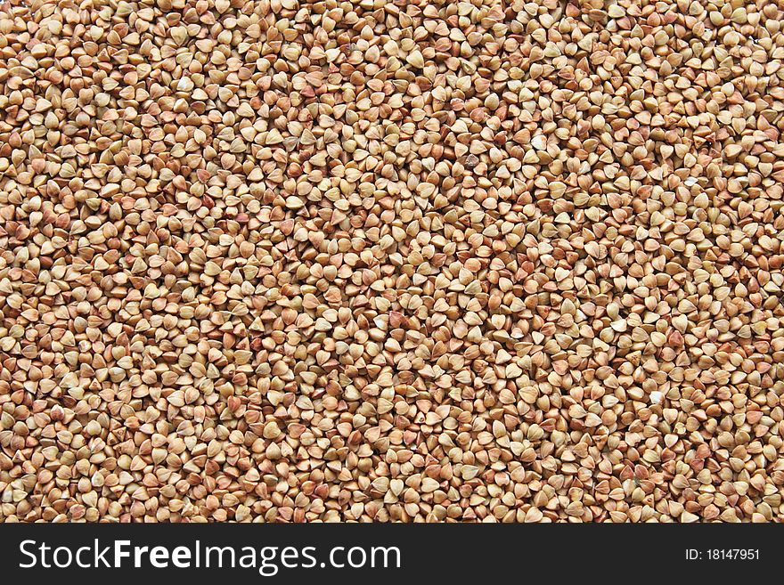 Seeds of buckwheat, background in the form of a quadrangle