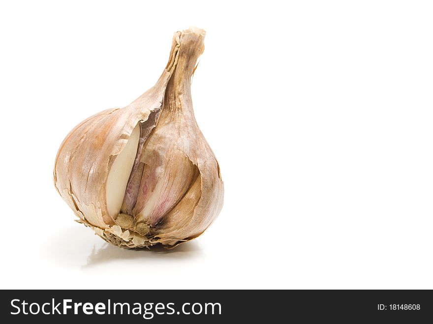 The garlic is solated on a white background