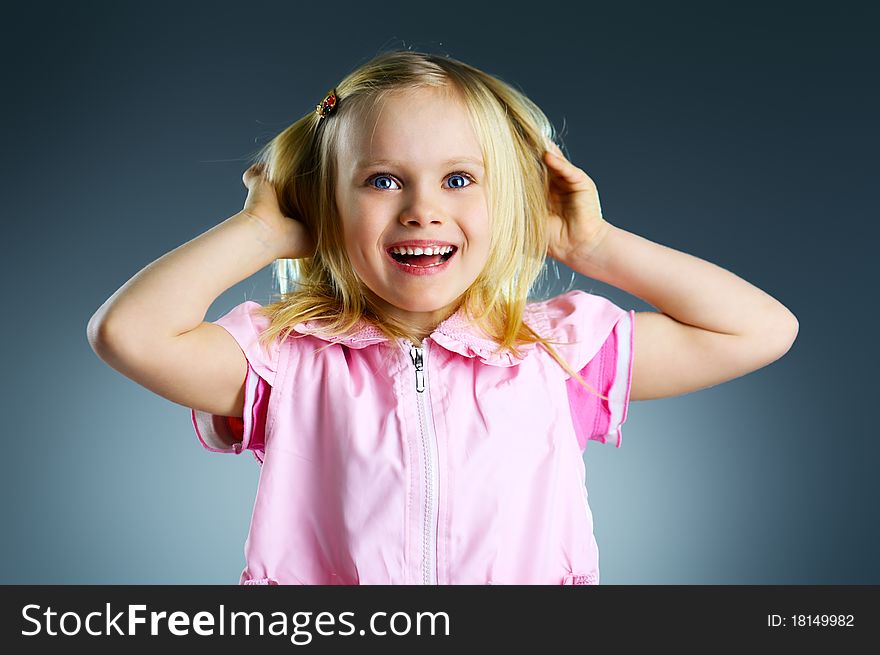 The portrait of a beautiful little girl. The portrait of a beautiful little girl.