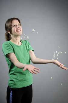 Happy Woman Throwing Pills Royalty Free Stock Images