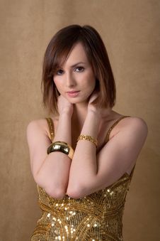Beautiful Young Woman In Gold Dress Stock Photography Beautiful Young Woman In Gold Dress Stock Photography