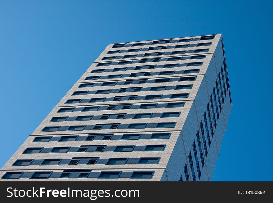 High skyscraper with blue sky