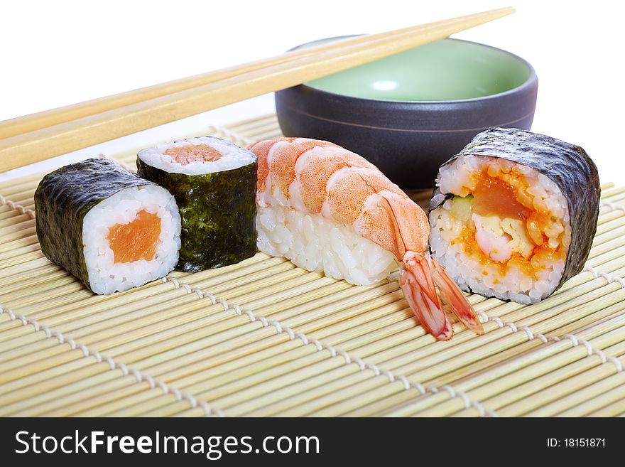 Delicious maki sushi with smoked salmon, shrimp and caviar. Delicious maki sushi with smoked salmon, shrimp and caviar.