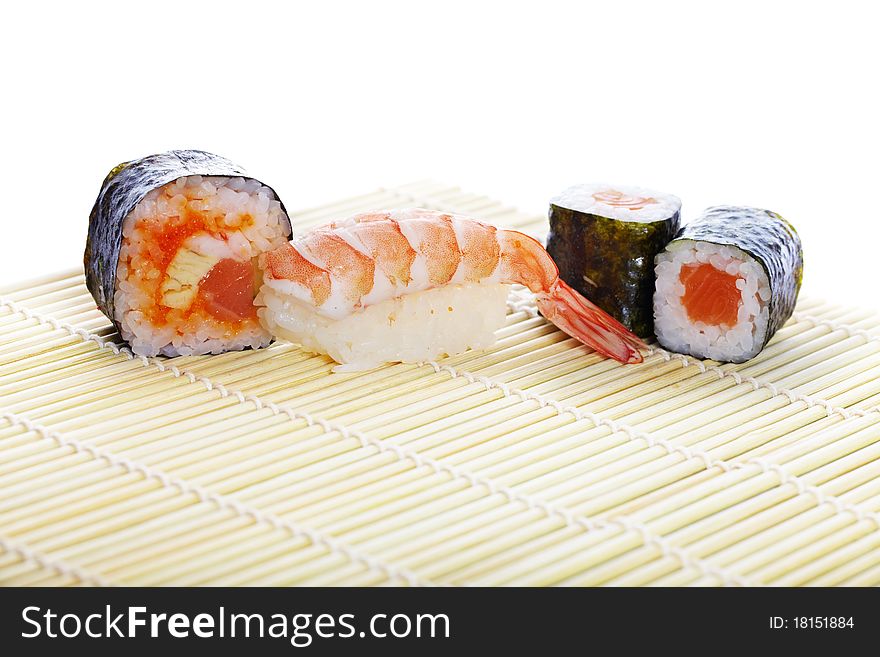 Delicious maki sushi with salmon, shrimp, cheese and caviar. Traditional Asian food. Delicious maki sushi with salmon, shrimp, cheese and caviar. Traditional Asian food.