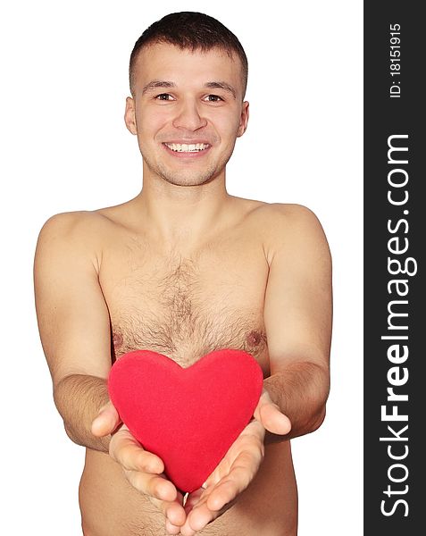 Young naked man holds the red heart. Young naked man holds the red heart