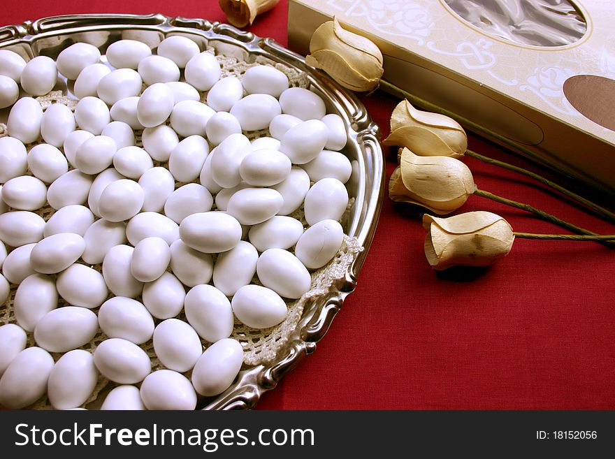 Silver tray with sugarcoated almonds. Silver tray with sugarcoated almonds