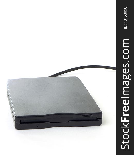 A black external usb floppy disk drive, isolated on white background. A black external usb floppy disk drive, isolated on white background