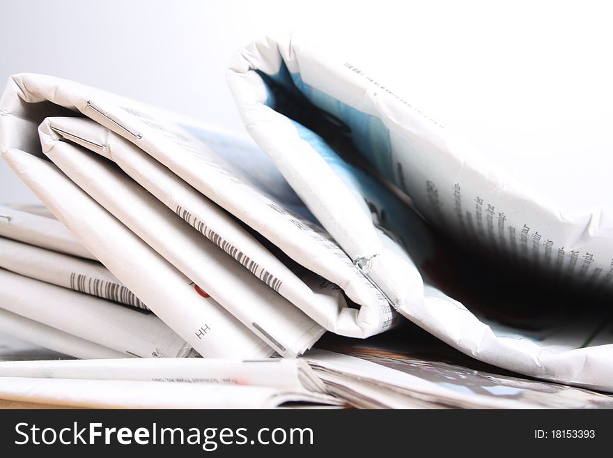 There are newspapers with a white background
