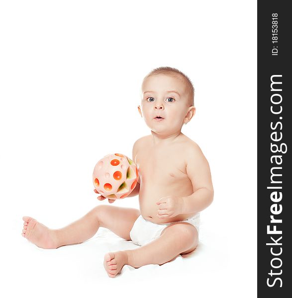Baby boy with ball on a white background