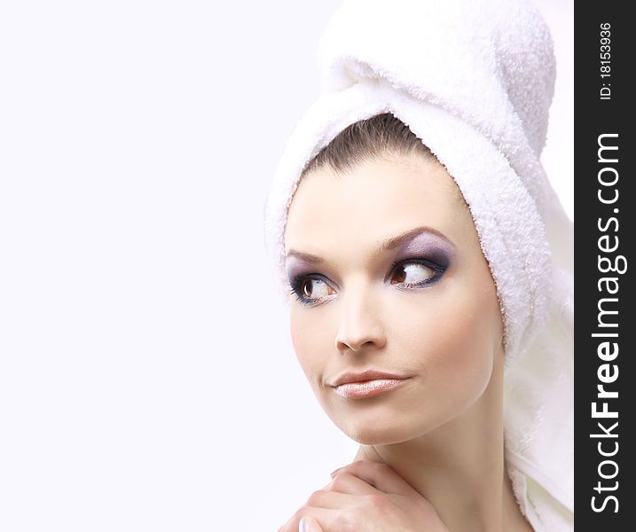 Closeup, studio shot of a satisfied, fresh and young beautiful woman.