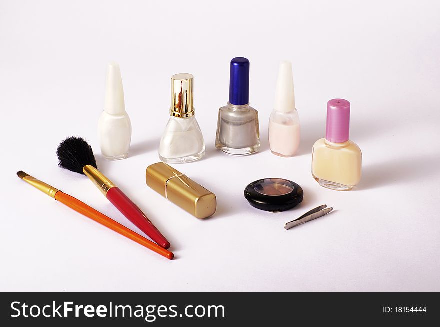 Various makeup items on a table. Various makeup items on a table