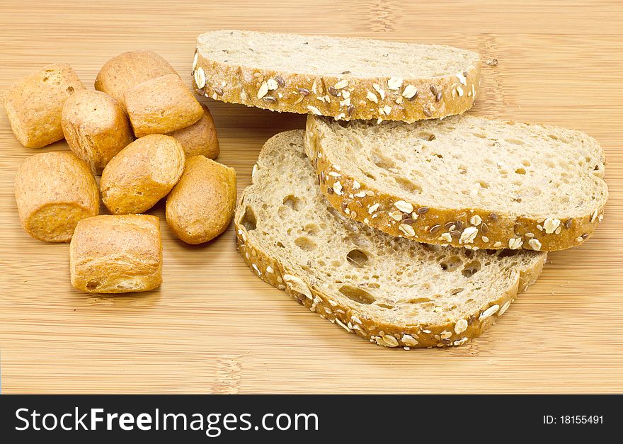 Sliced bread on wooden background