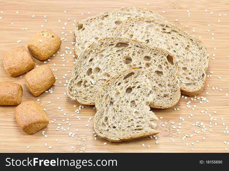 Sliced bread on wooden background