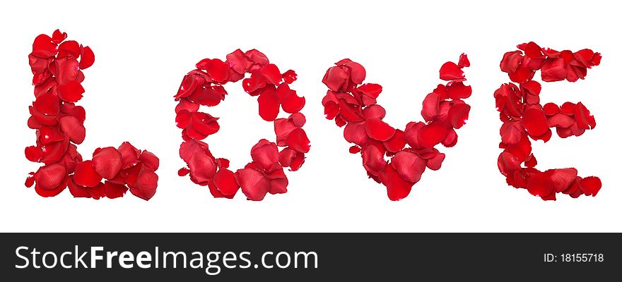 Red rose petals set in word LOVE