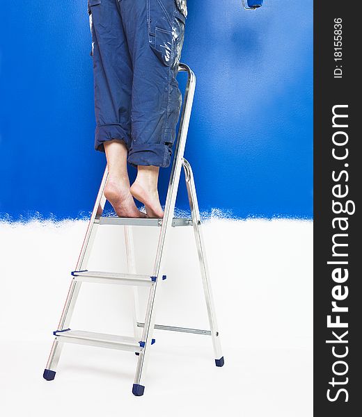 Painting Girl on a step ladder