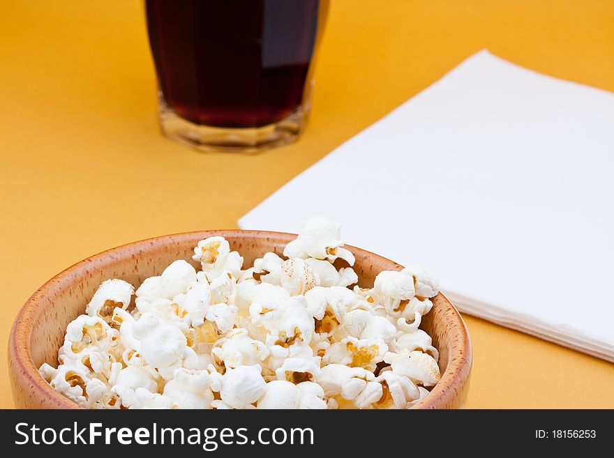 Pop corn in bowl and cola. Pop corn in bowl and cola