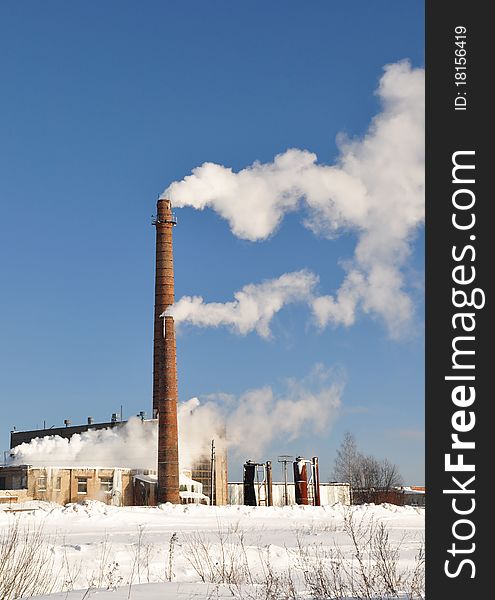 Two Smoking chimneys. Plant. Winter. Two Smoking chimneys. Plant. Winter.