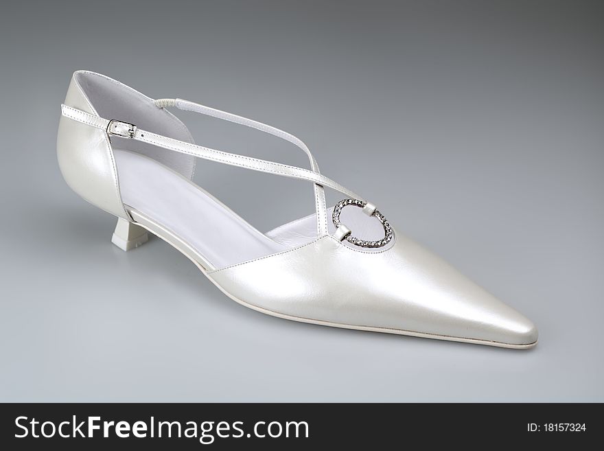 White woman shoe for ceremony and wedding. White woman shoe for ceremony and wedding