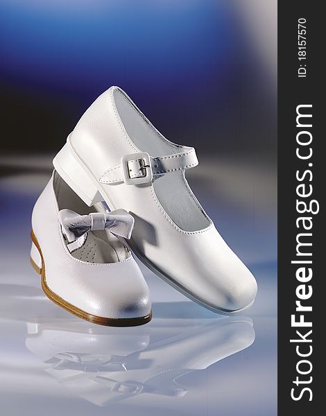 White children shoe for ceremony and wedding. White children shoe for ceremony and wedding