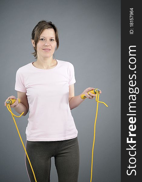 Woman Exercising Jumping Rope