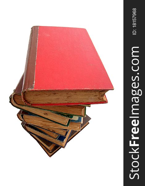 Old books piled together over white background