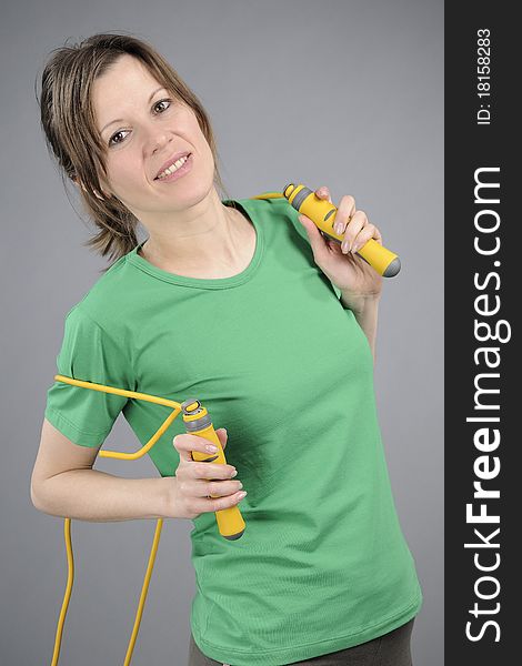 Healthy woman posing with jumping rope. Healthy woman posing with jumping rope