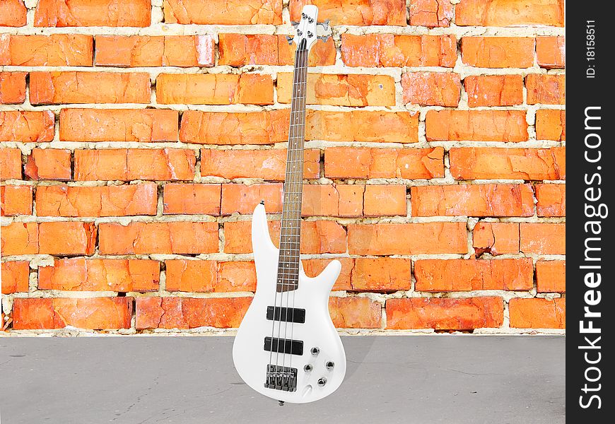 Background with the image of ruined brick wall and guitar. Background with the image of ruined brick wall and guitar