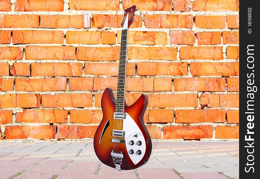 Brick wall and guitar