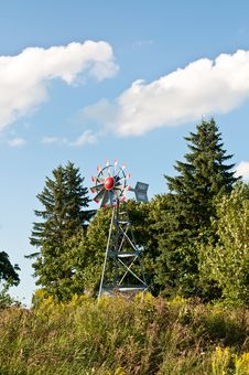 Windmill With Trees And Blue Sky Stock Images Windmill With Trees And Blue Sky Stock Images