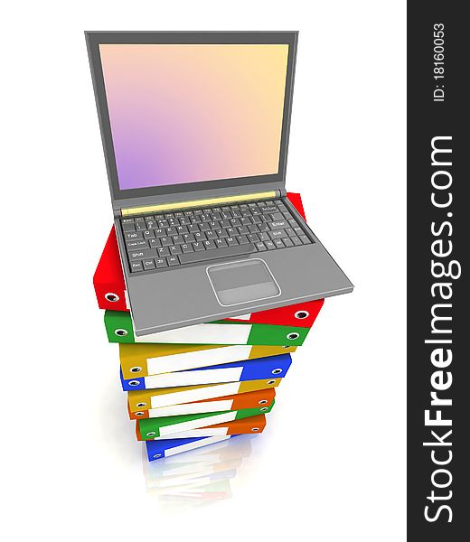 Colorful books next to a modern laptop