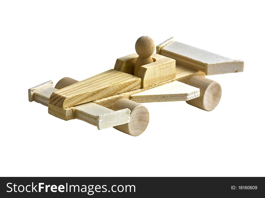 Wooden toy race car with driver on white background. Wooden toy race car with driver on white background
