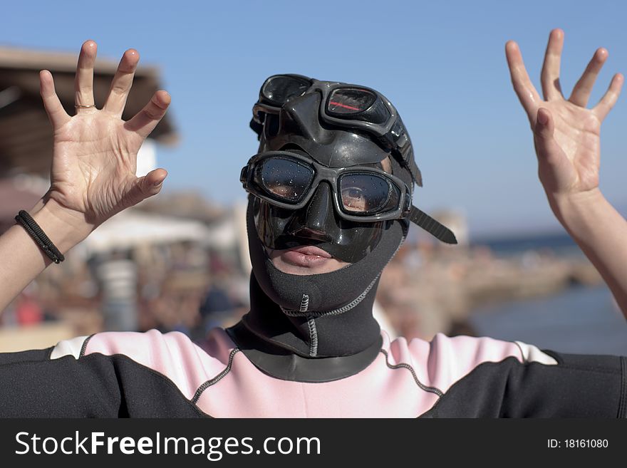 Portrait girl-diver in mask and swimsuit, doing boo!. from seria diver girl. Portrait girl-diver in mask and swimsuit, doing boo!. from seria diver girl