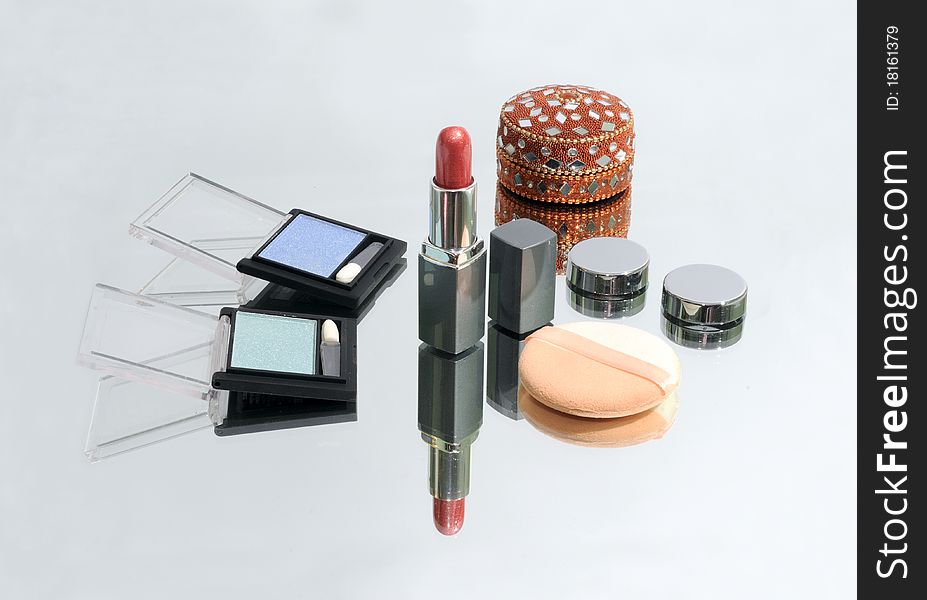Collection of make-up products and jewel-box