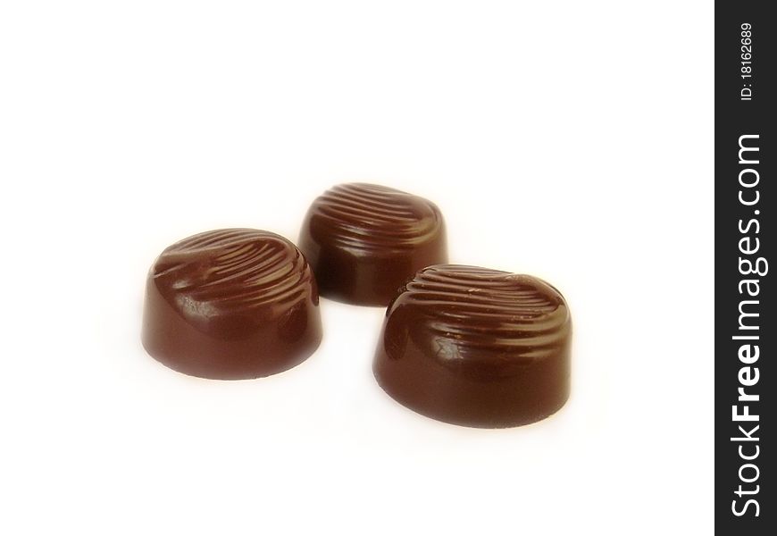 Three chocolate candies, isoalted image