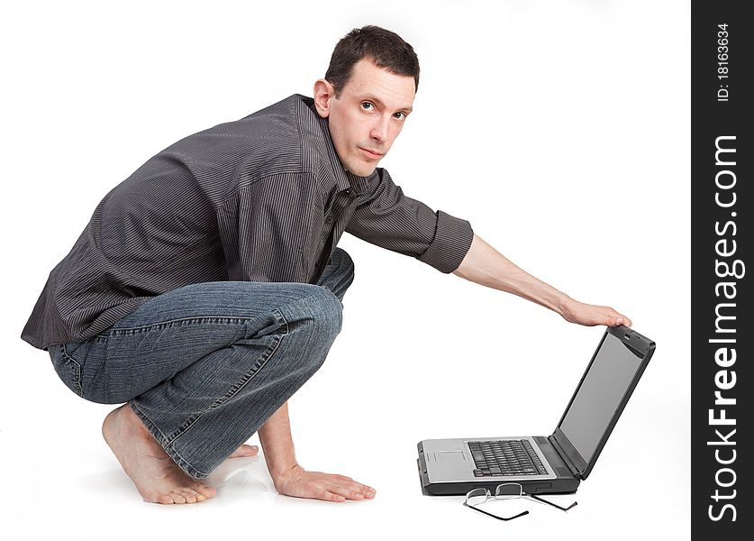 Guy with the laptop isolated on a white background
