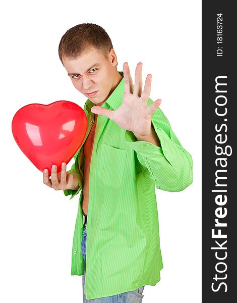 Young guy holding a red heart-shaped balloon on a white background