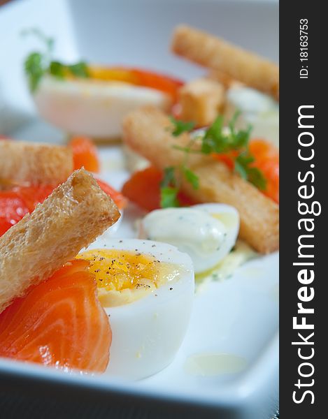 Fresh smoked salmon with eggs and toast